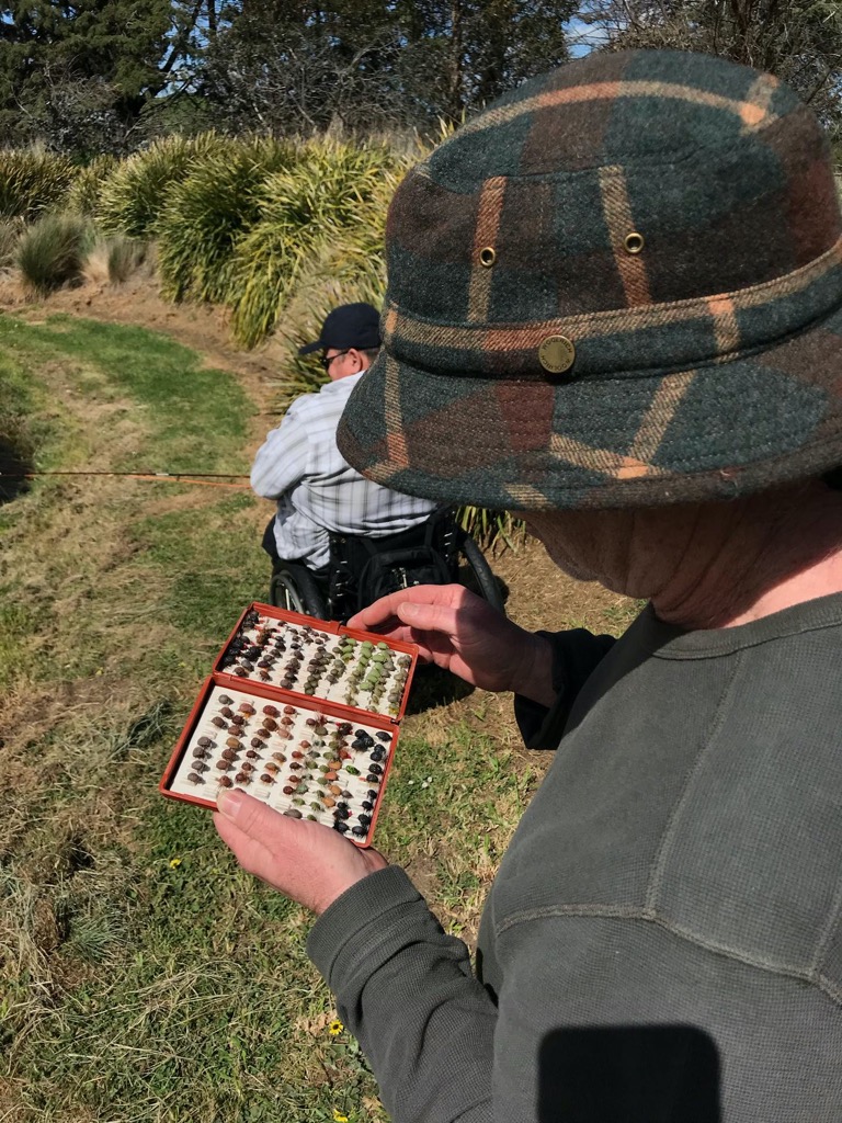Casting Pool guide, Jim Morris, helps Hamish Murray christen his cane rod